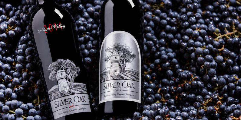 Silver Oak 2014 Alexander and Napa Valley wines on bed of grapes