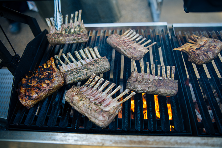 Backyard Cookout Tips. Racks of lamb on the grill.