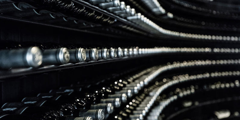 Rows of Silver Oak wine bottles in the wine library