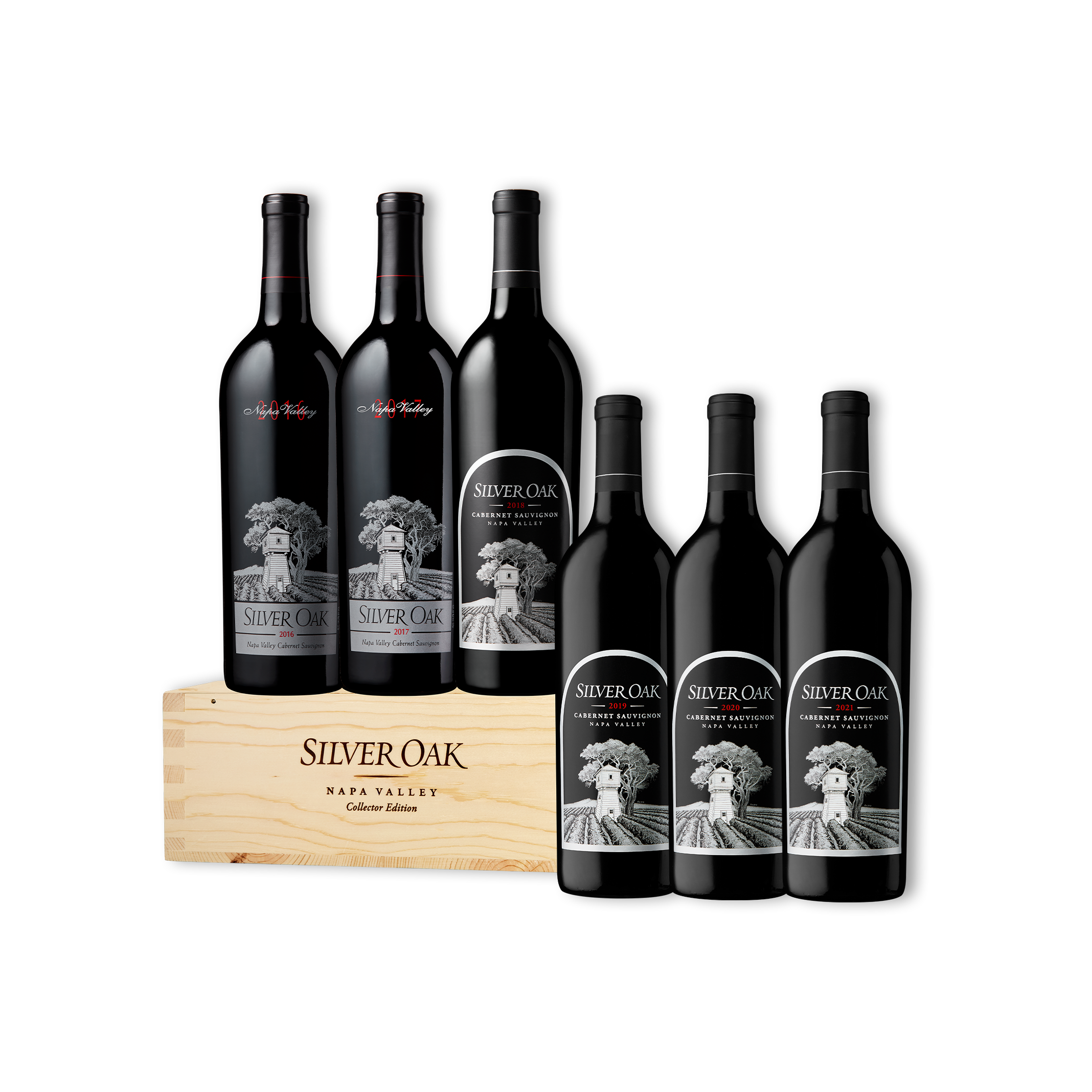 Six Silver Oak Napa Valley Cabernet Sauvignon wine bottles arranged with an engraved wooden collector's edition box