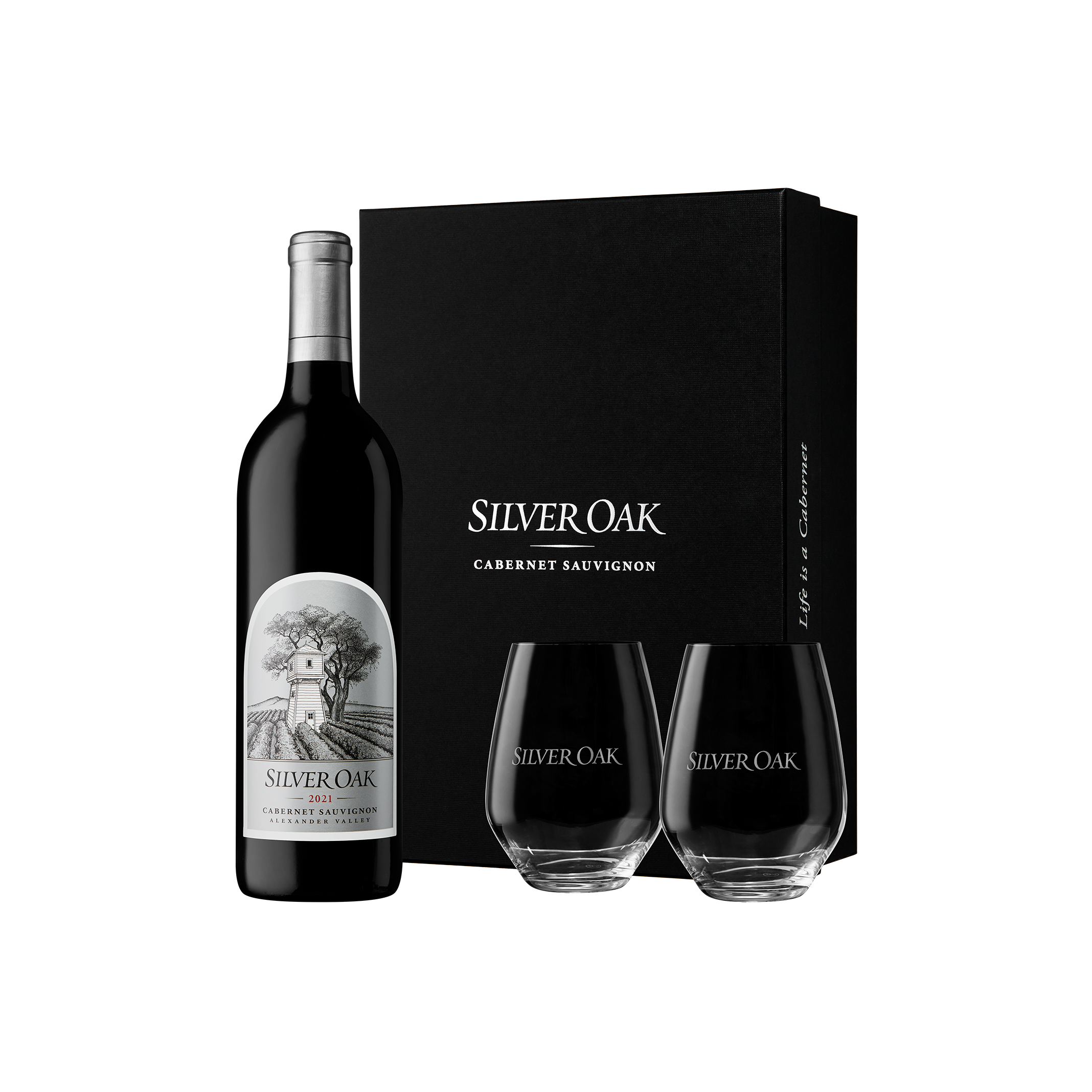 Silver Oak 2021 Alexander Valley Cabernet Sauvignon wine bottle with two stemless wine glasses glasses and a black gift box on a white background