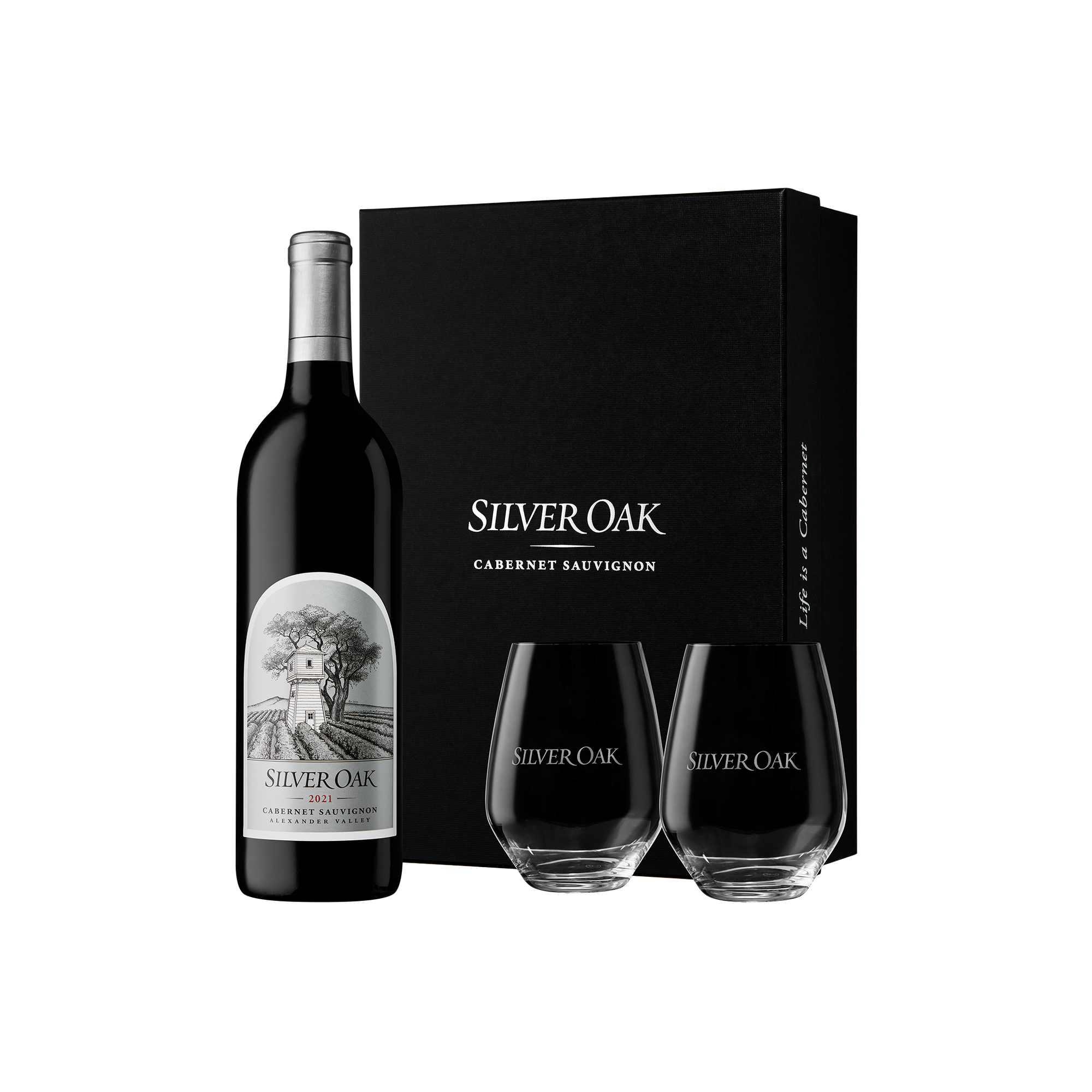 Silver Oak 2021 Alexander Valley Cabernet Sauvignon wine bottle with two stemless wine glasses glasses and a black gift box on a white background