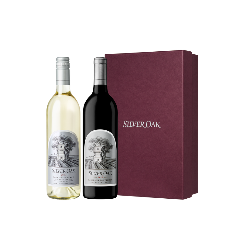 A bottle of Silver Oak Sauvignon Blanc and Alexander Valley Cabernet Sauvignon with a burgundy gift box | Cabernet & Sauvignon Blanc Holiday Gift